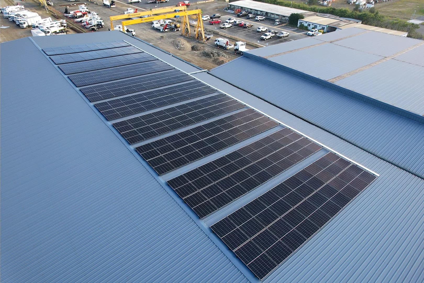 Solar panels installed across a commercial roof